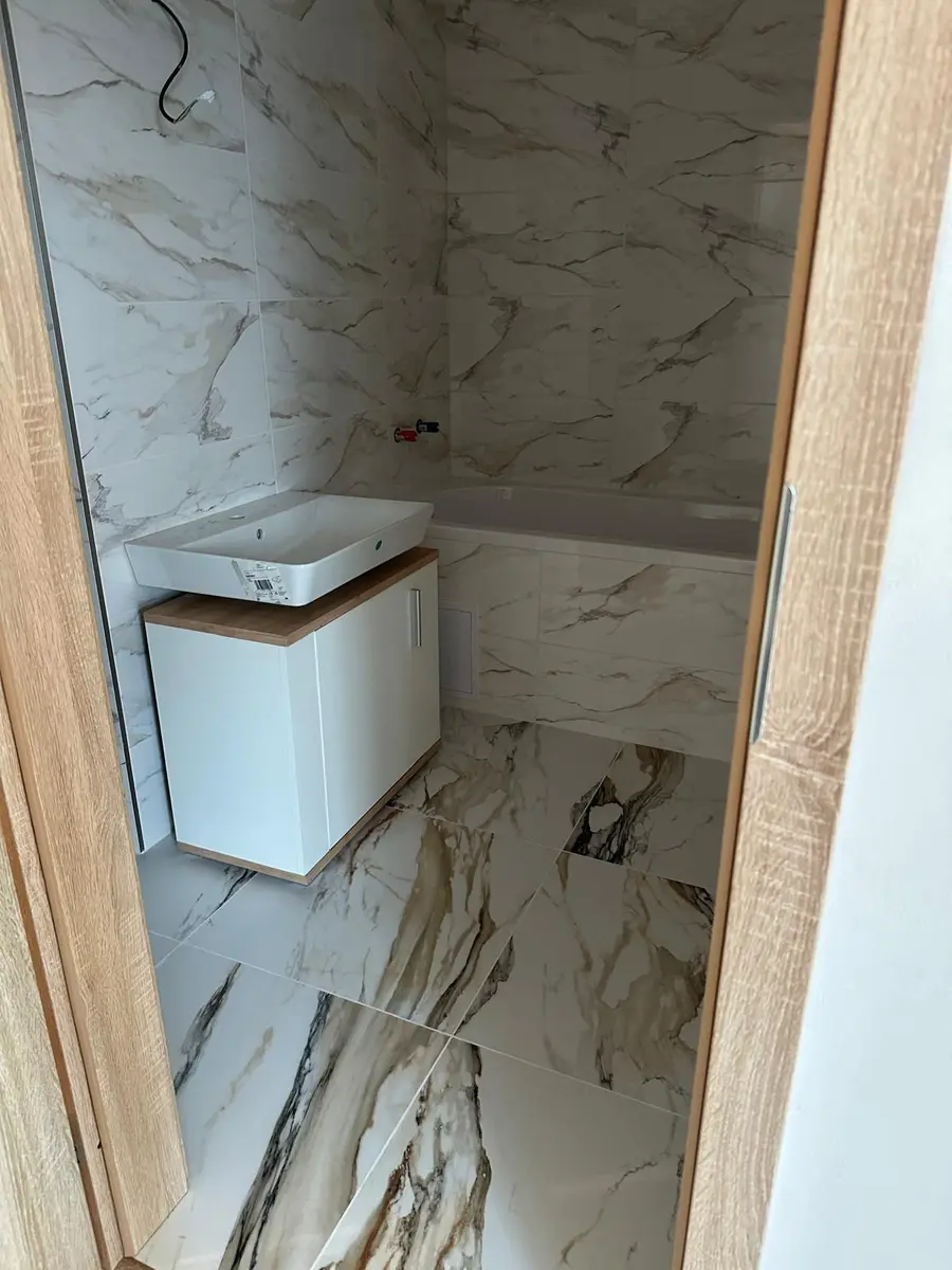 Zateplení podkroví minerální vatou mezi krokvemi střechy